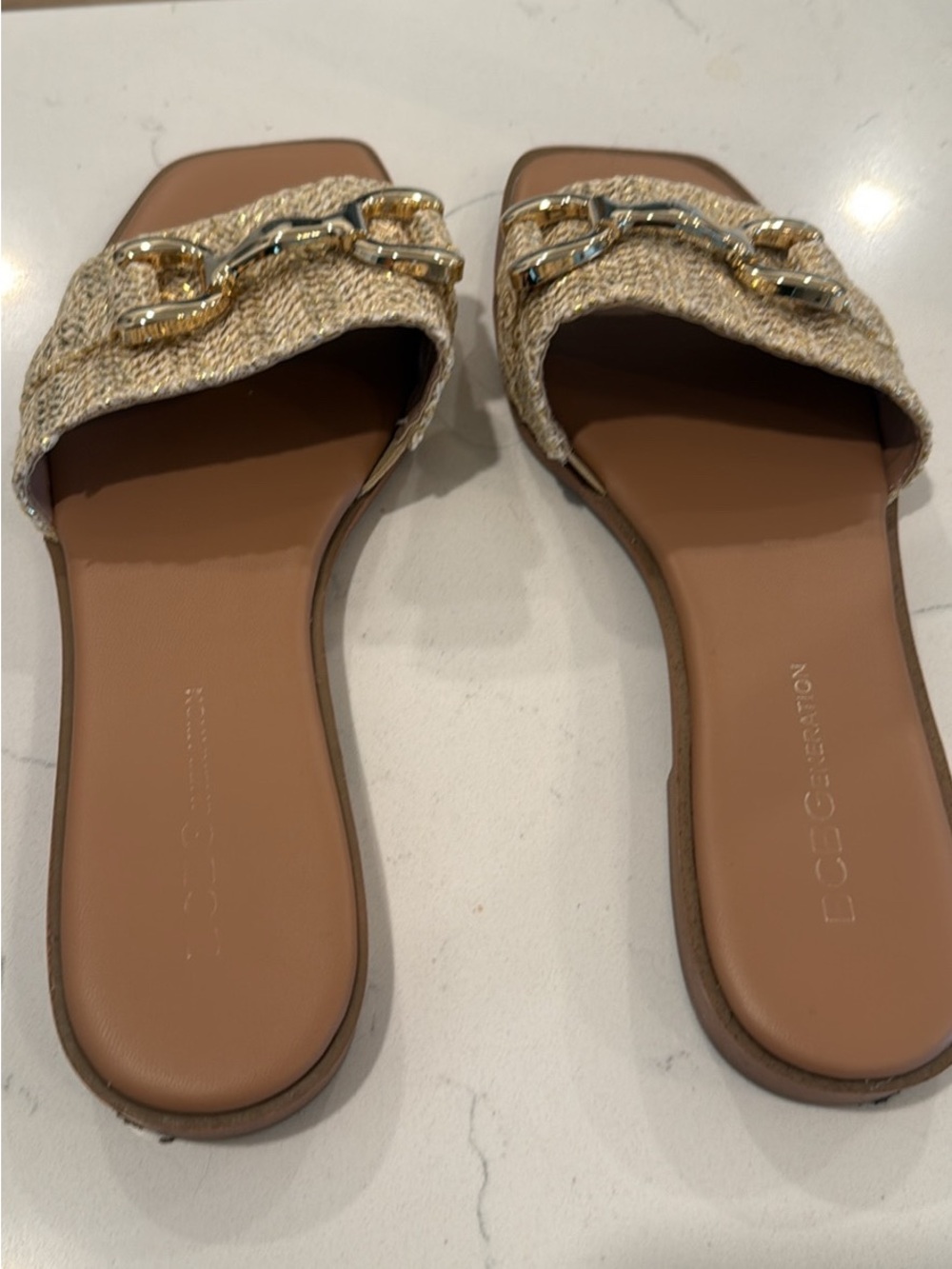 BCBG Generation Slide Sandals with Gold Chain Accent in Beige